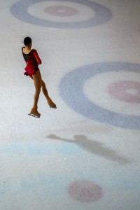 Figure skater performing a jump unsplash
